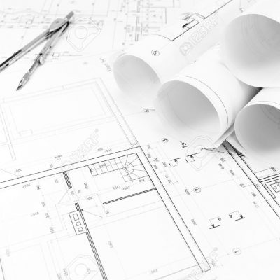 27077790-Architectural-background-with-floor-plans-and-rolls-of-technical-drawings-Stock-Photo